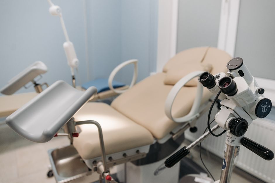 A sterile and well-equipped medical examination room with a focus on precision instruments.
